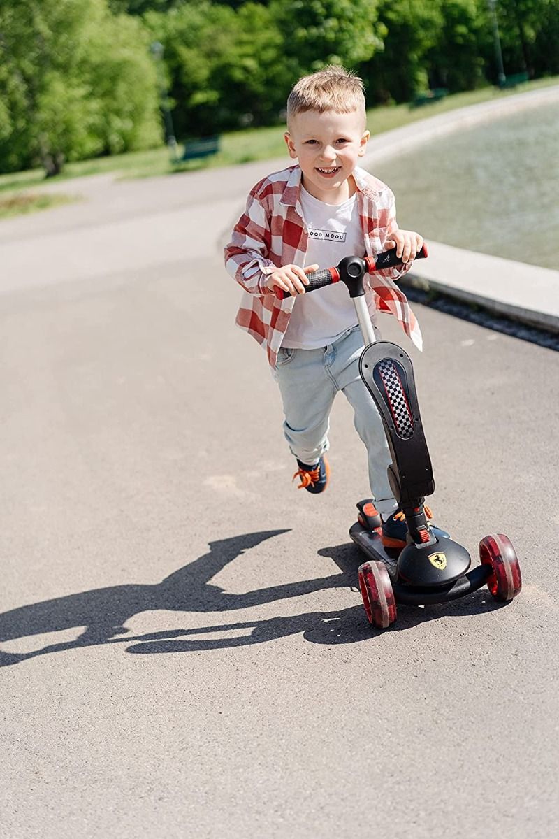 FERRARI TWIST SCOOTER FOR KIDS 
WITH ADJUSTABLE HEIGHT BLACK